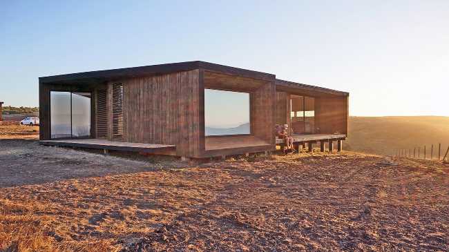Wooden house at sunset